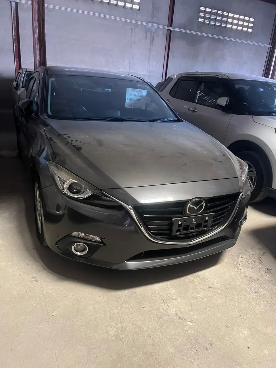 2015 Mazda Axela, gray — photo 1 of 4