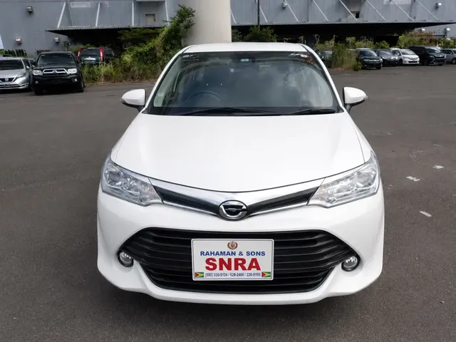 2021 Toyota Corolla Axio, white sedan for sale at Rahaman & Sons, Success — arriving soon