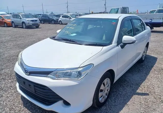 2015 Toyota Corolla Axio, white sedan for sale at Rahaman & Sons, Success — arriving soon