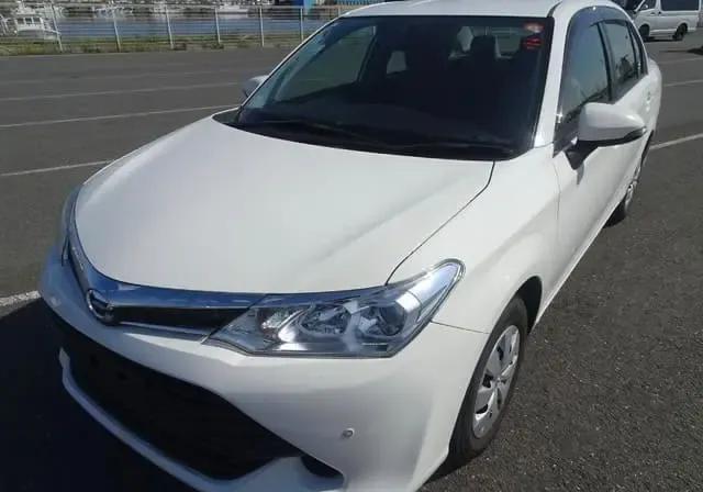 2015 Toyota Corolla Axio, white sedan for sale at Rahaman & Sons, Success — arriving soon