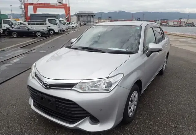 2016 Toyota Corolla Axio, white sedan for sale at Rahaman & Sons, Success — arriving soon