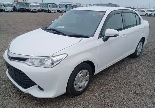 2016 Toyota Corolla Axio, white sedan for sale at Rahaman & Sons, Success — arriving soon