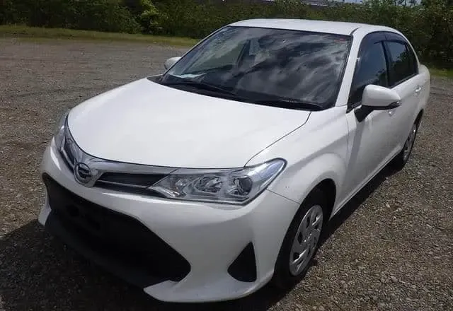 2018 Toyota Corolla Axio, white sedan for sale at Rahaman & Sons, Success — arriving soon