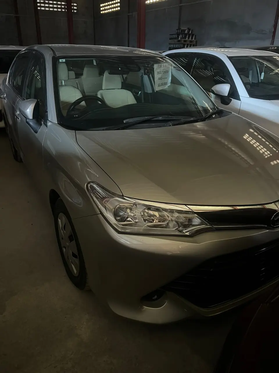 2015 Toyota Corolla Axio, silver — photo 1 of 4