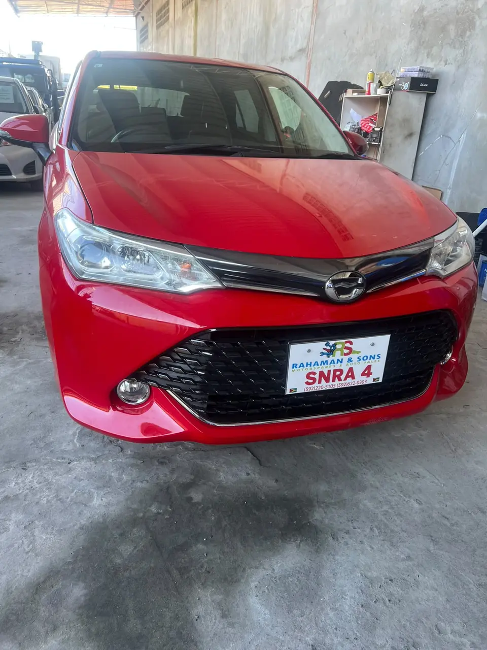 2015 Toyota Corolla Fielder, red — photo 1 of 4